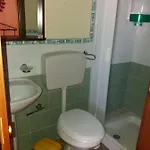A Stanza Con Bagno Apartahotel